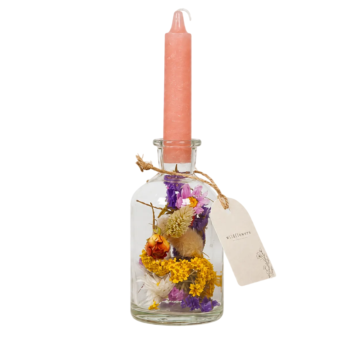Glass bottle with pink candle, dried flowers, and a tag on a white background
