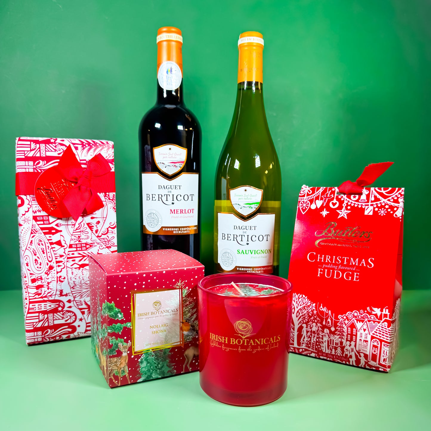 Fireside Favourites Christmas hamper with Daguet de Berticot wines, Butlers fudge and Irish Botanicals candle | corporate christmas hamper ireland