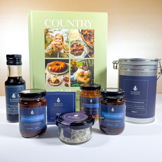 Gourmet Irish food gift set with Burren Balsamics chutneys, marmalade, jams, balsamic vinegar, shortbread tin and the Country cookbook displayed together.