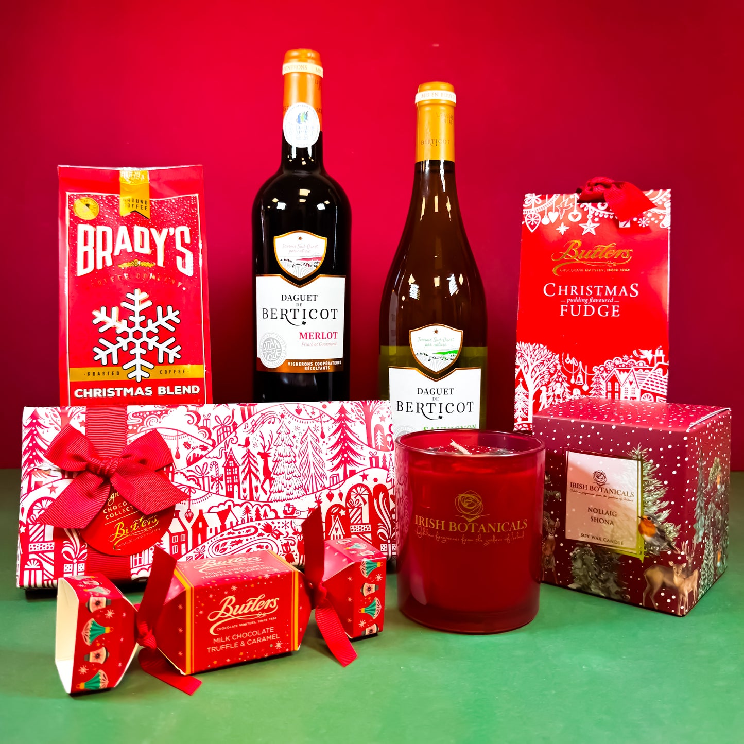 Noël Christmas hamper with red and white wines, Irish chocolates, coffee and festive candle. Corporate Christmas Hamper | Staff Christmas Hamper