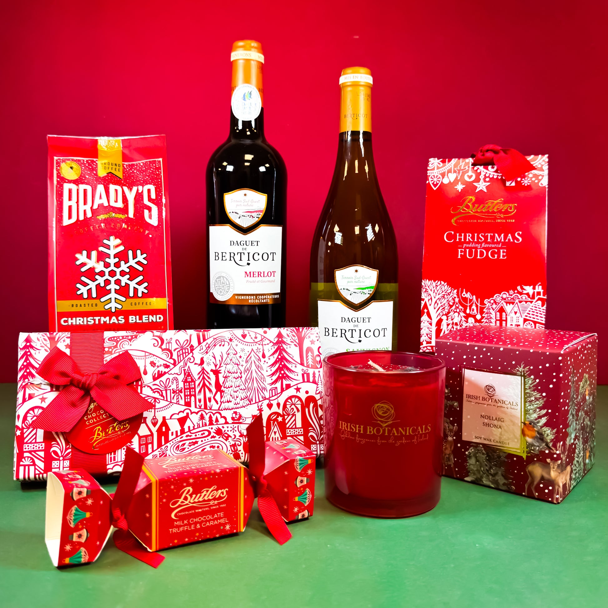 Noël Christmas hamper with red and white wines, Irish chocolates, coffee and festive candle. Corporate Christmas Hamper | Staff Christmas Hamper