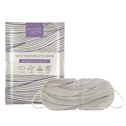 Self-heating eye mask with packaging on a white background